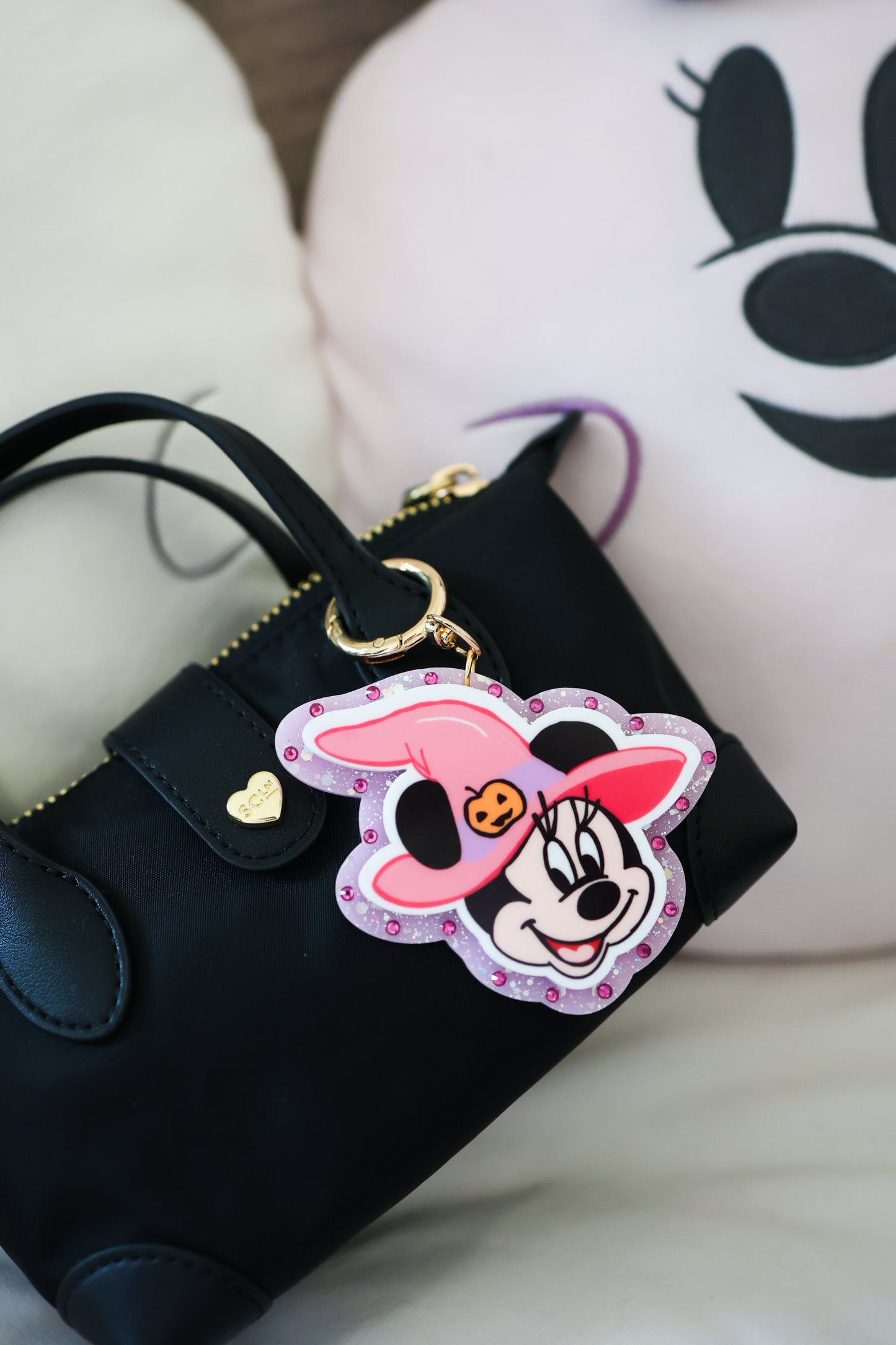 Pink witch bag charm