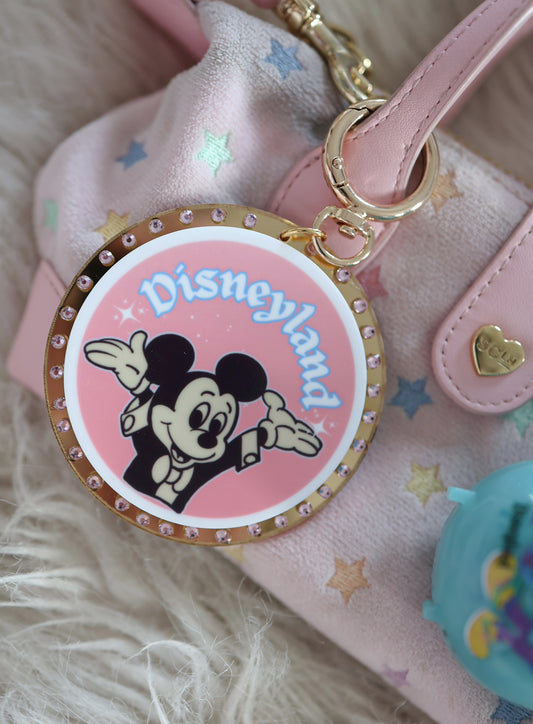 An original pink bag charm