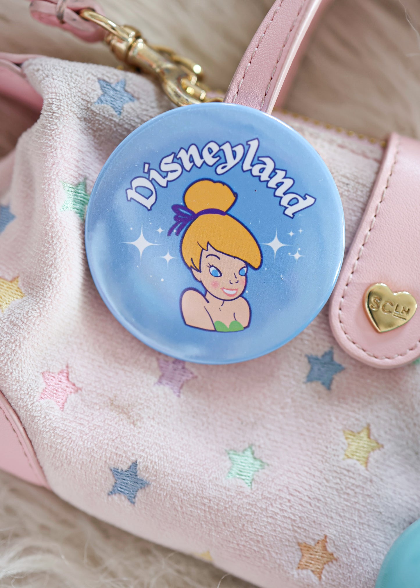 An original blue button