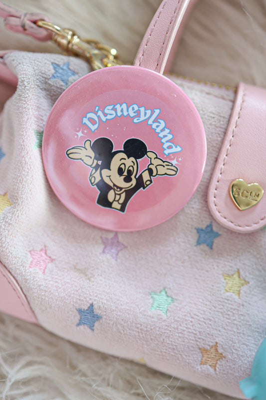 An original pink button