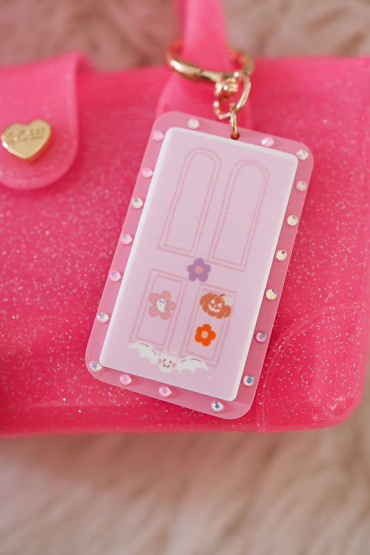 Seasonal pink door bag charm